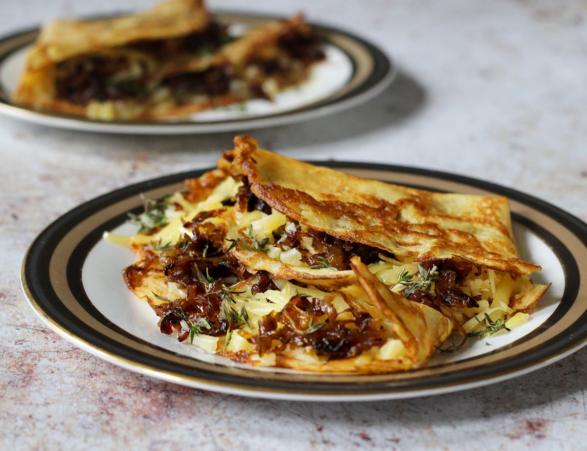 15 Delicious Savory Crepes For Breakfast, Lunch, And Dinner Caramelized Onion and Gruyère Crepe