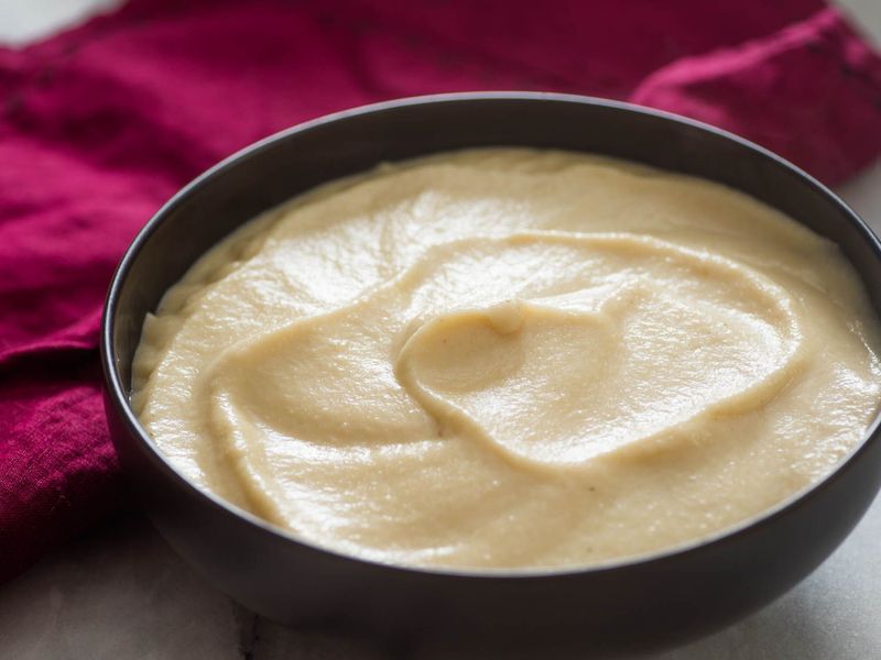 Swap béchamel sauce with cauliflower purée for a lighter option