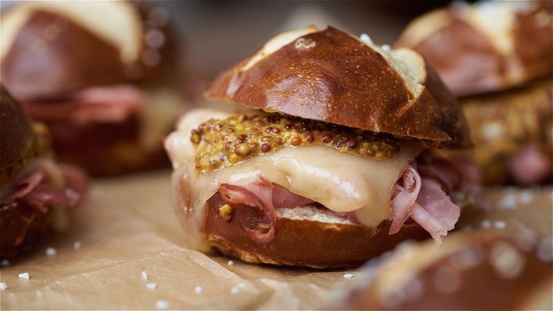 Hot Cross Bun Sliders with Ham & Swiss