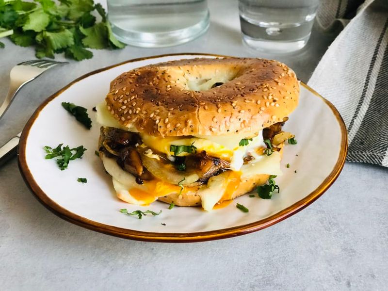 Egg, Cheese, and Mushroom Bagel Sandwich