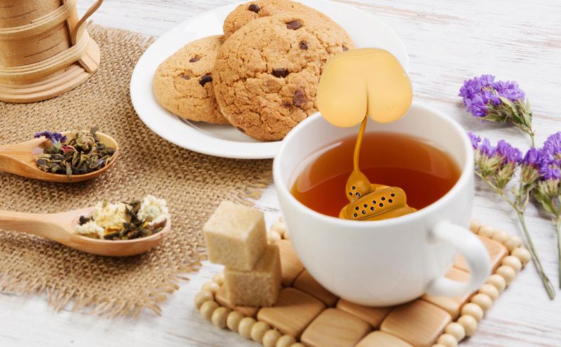 Herbal Tea And A Small Biscuit