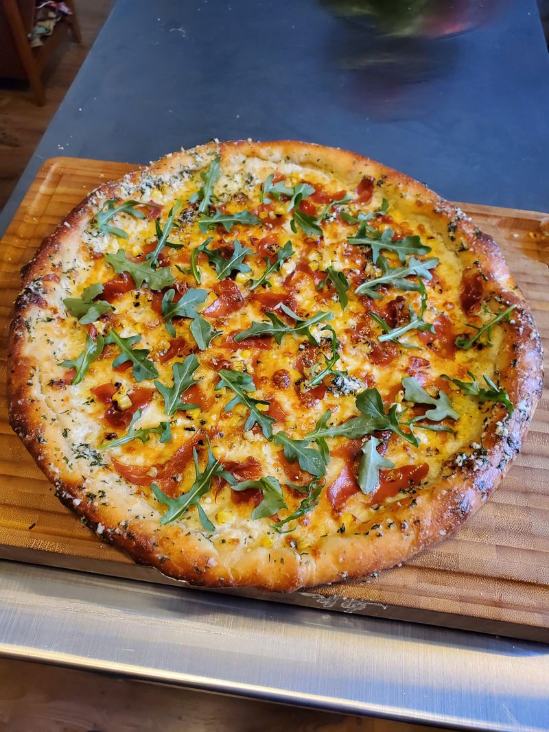 Prosciutto Pizza with Corn & Arugula