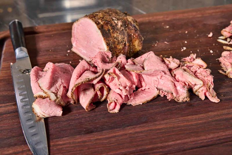 Carved meats under heat lamps