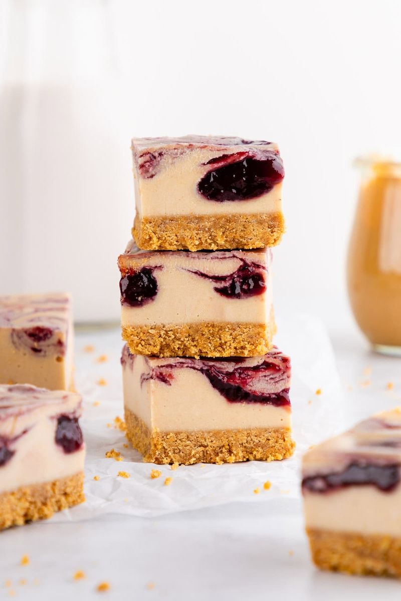 Peanut Butter and Jelly Cheesecake Bars