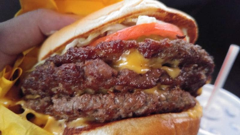 Whataburger's Triple Meat Whataburger with Bacon & Cheese