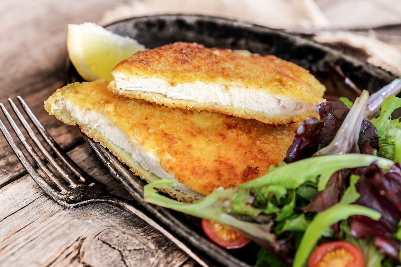 Anne Burrell's Chicken Milanese with Utica Greens
