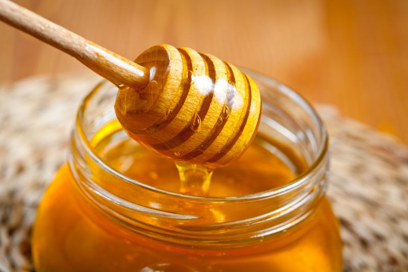 Honey Bottles Filled With Flavored Corn Syrup