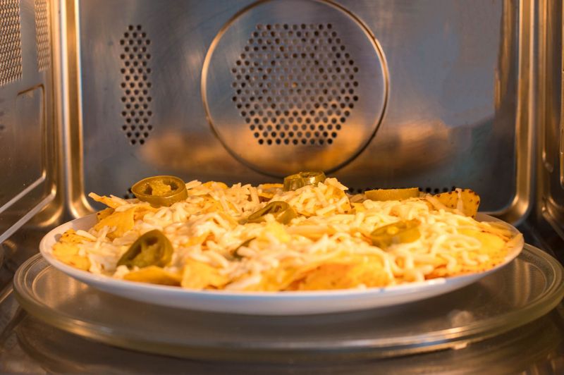 Tortilla Chips + Canned Cheese = Nacho Night
